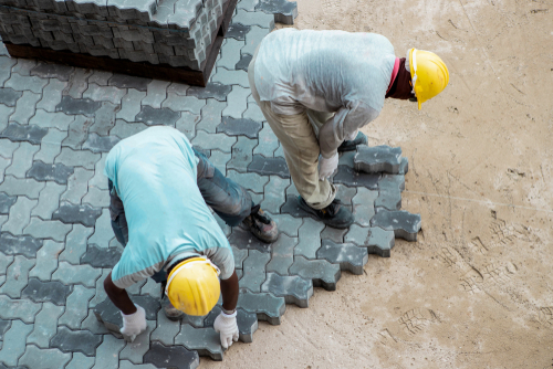 Professional Installation of Heavy Commercial Interlock Paving Curbstones